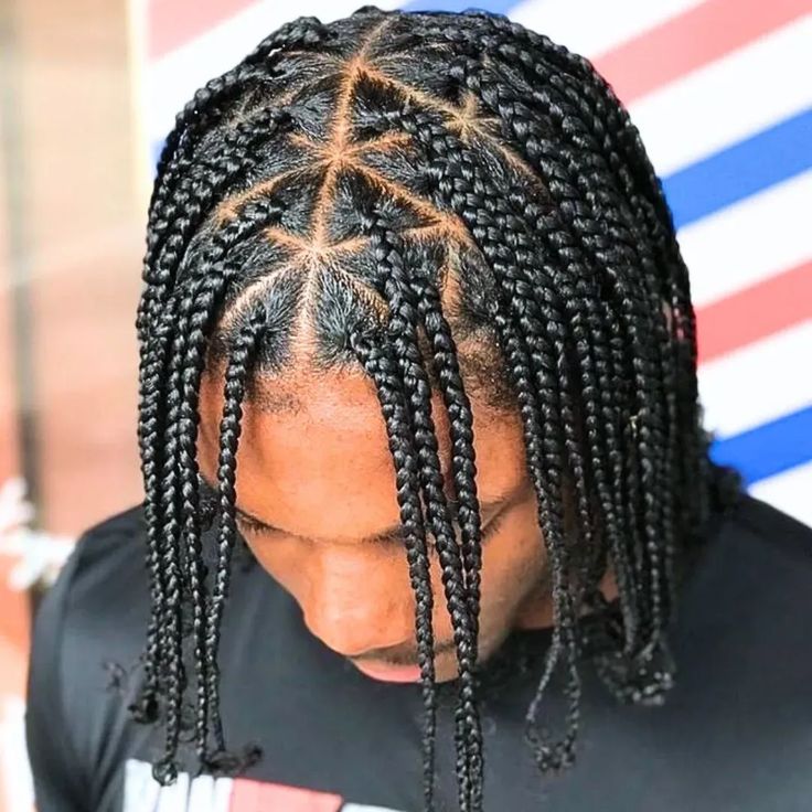 Men's box braids styled at KP Professional Hair Braiding
