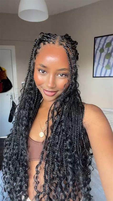 Boho knotless braids with curly ends styled in Brooklyn, NY